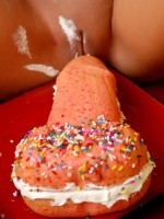 Carmen celebrates her birthday with a penis shaped cake